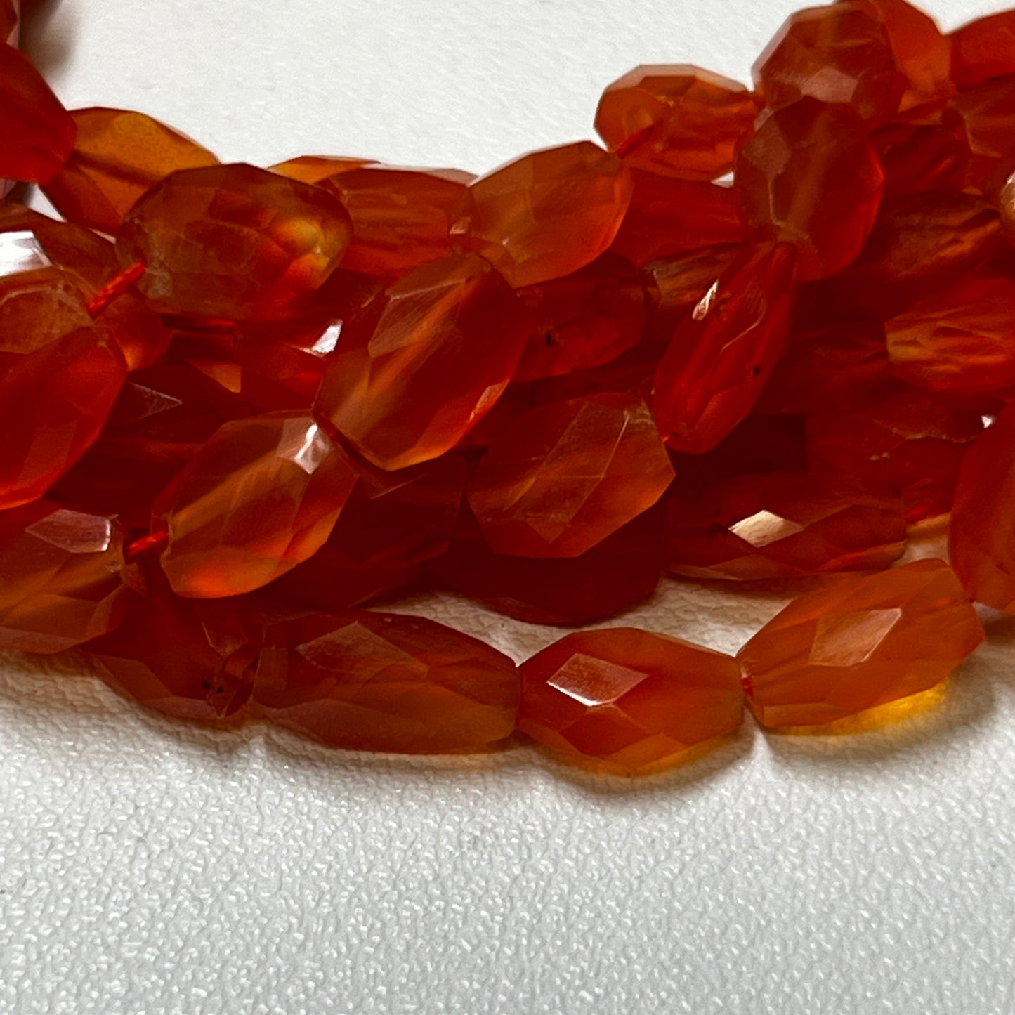 Carnelian faceted beads approx 6x9 16"