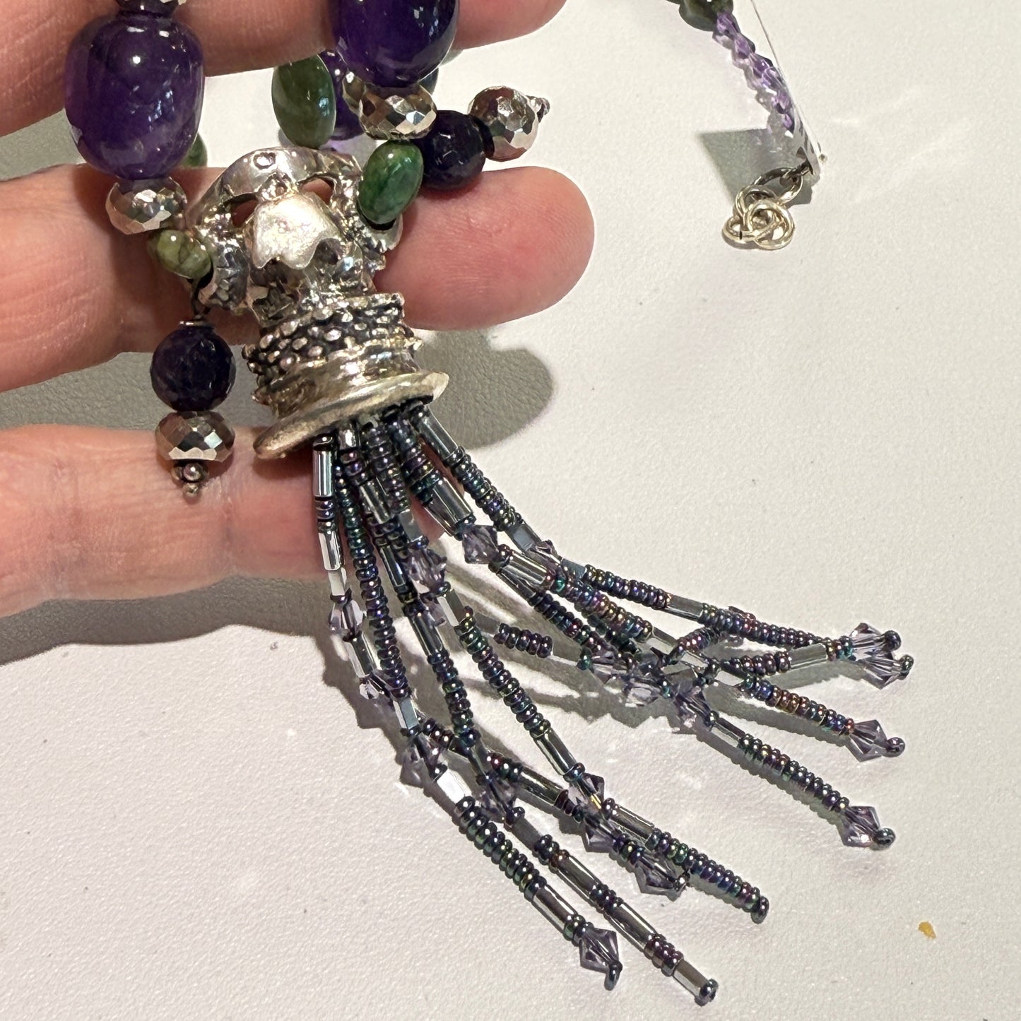 Quetzalcoatl  "Feathered Serpent" Emerald, Amethyst, Hematite and sterling silver  Approx 18"