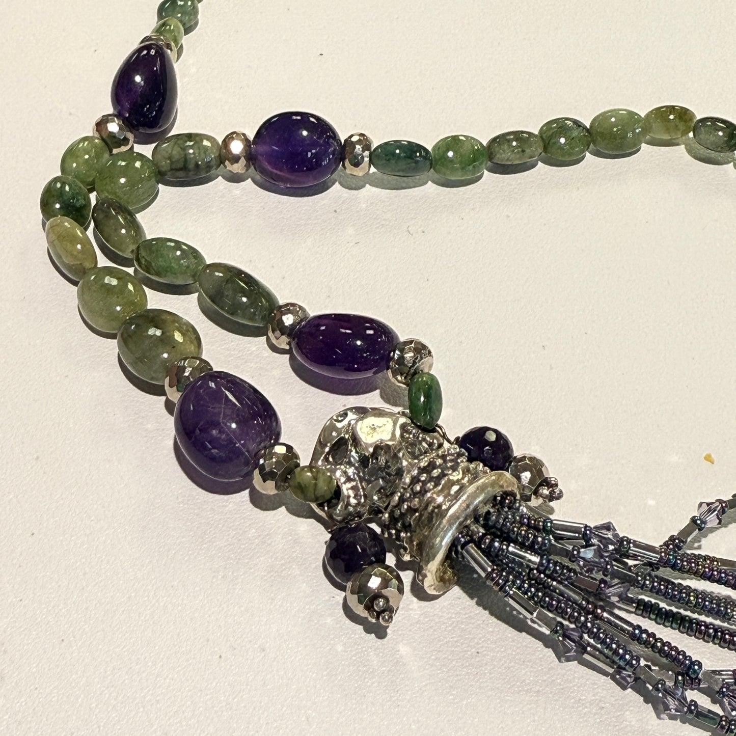 Quetzalcoatl  "Feathered Serpent" Emerald, Amethyst, Hematite and sterling silver  Approx 18"