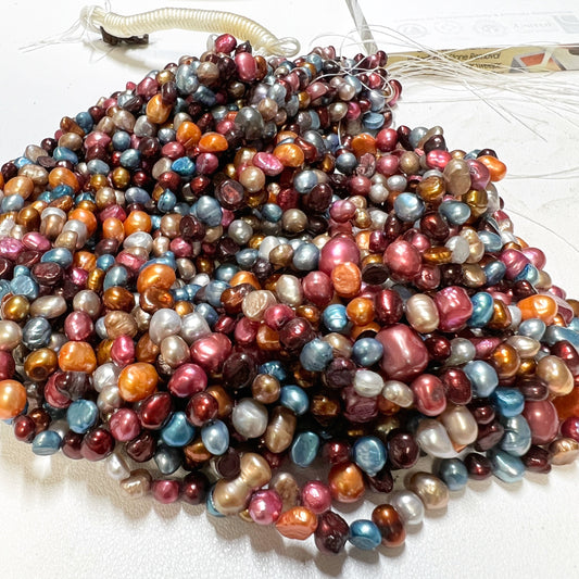 The perfect pearl for Autumn!  Color treated. 16" strands